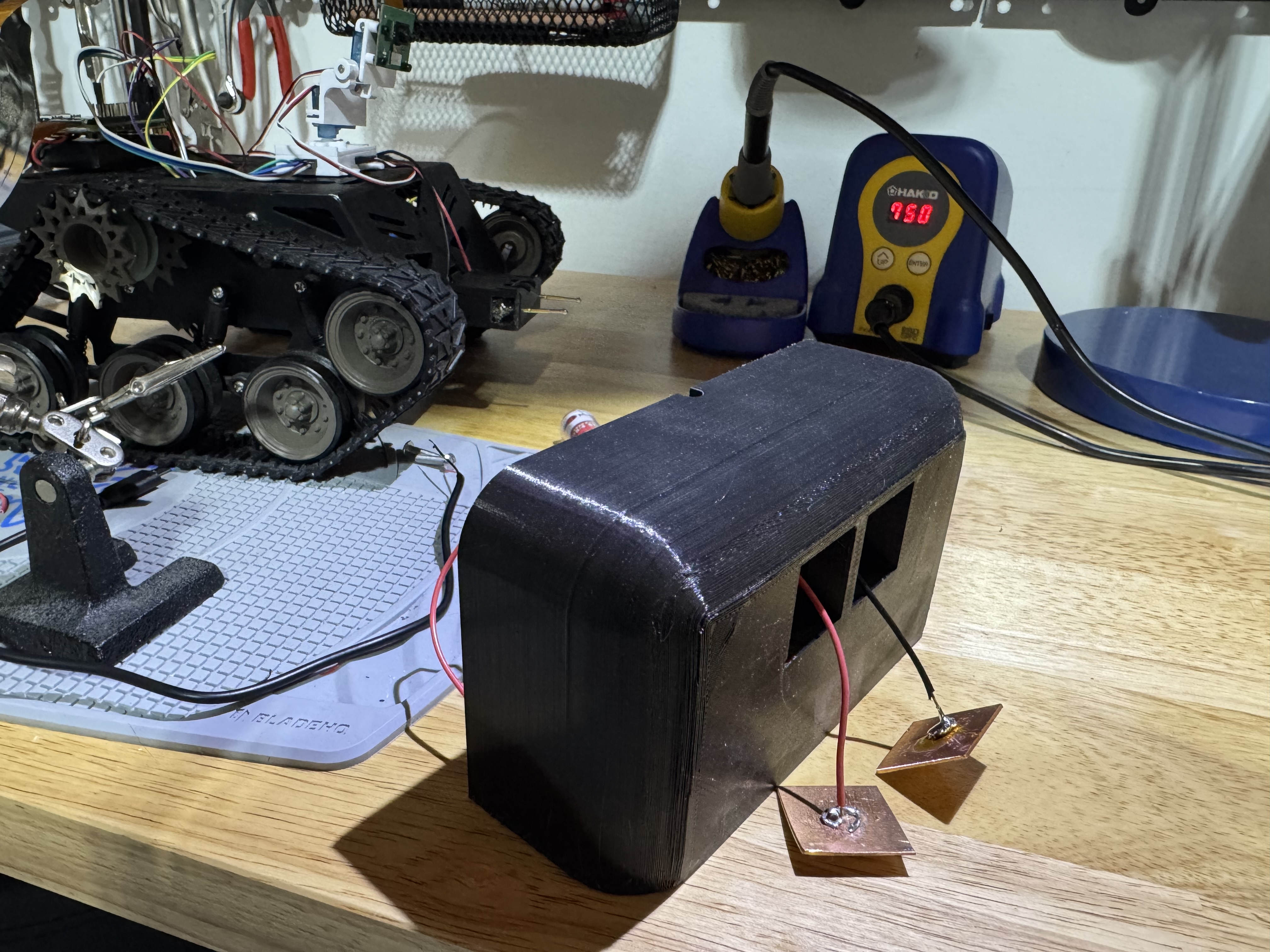 Dock with copper contact plates and dissected charger